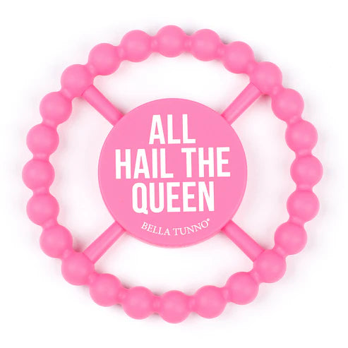 Circular silicone baby teether with "All Hail the Queen" phrase, textured edge, easy to grip and chew for teething relief.