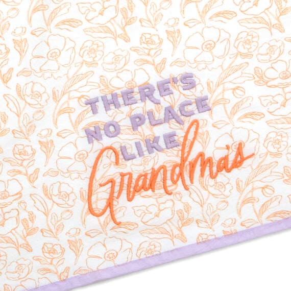 Hallmark Grandma gift set with lavender floral mug, ceramic spoon, and embroidered tea towel reading "There&