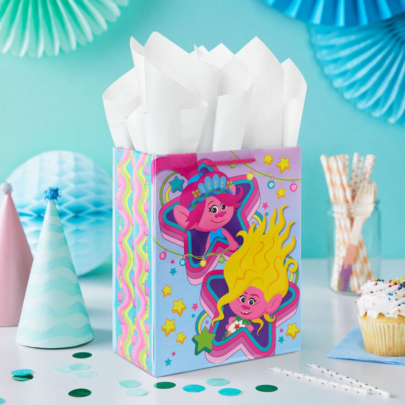 Trolls Band Together medium gift bag featuring Poppy and Viva with star accents on a pink and blue ombré background, 9.6