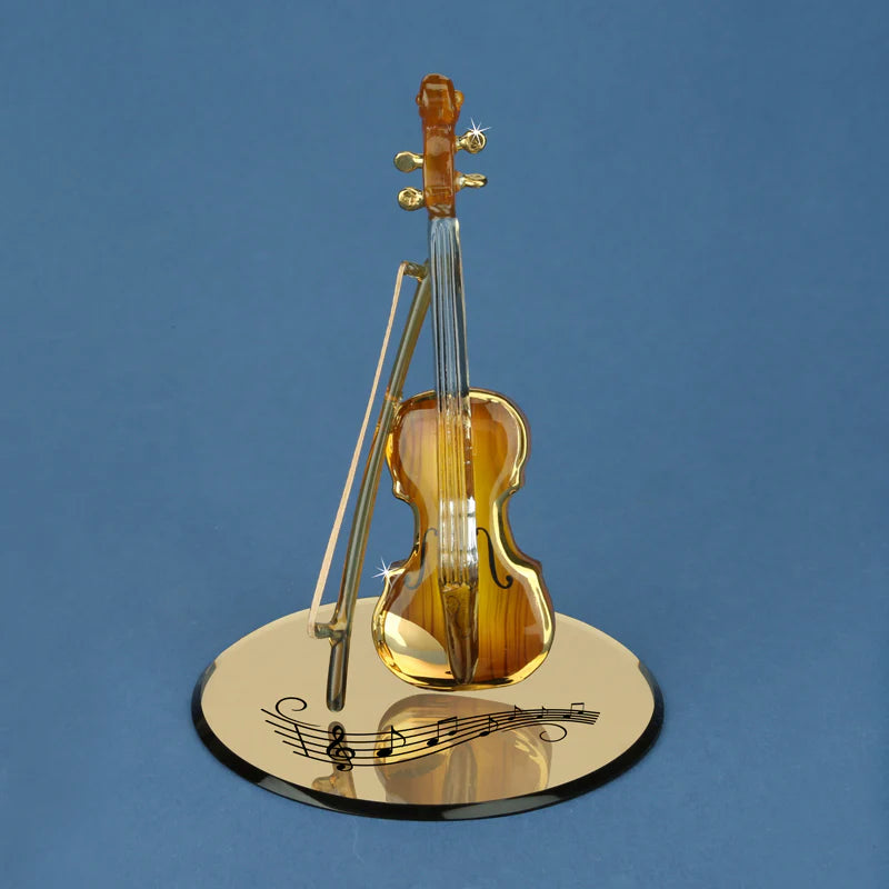 Handcrafted glass violin figurine with 22Kt gold accents on a beveled mirror base with music notes