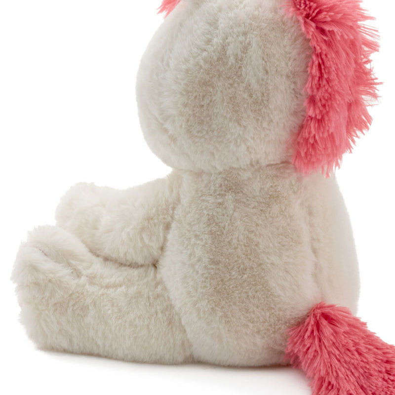 Big Sister unicorn plush toy with white fur, pink corduroy feet, coral mane, and stitched “Big Sis” lettering