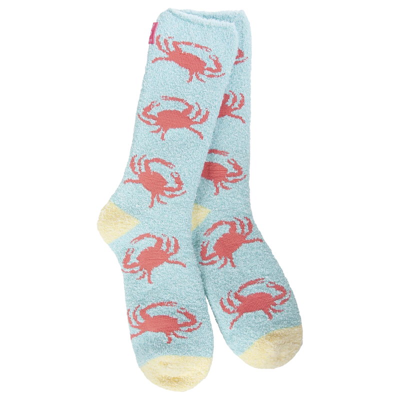 Soft pink crab-themed cozy crew socks with knit texture.