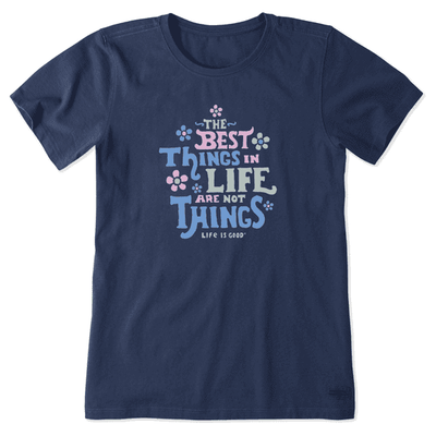 "The best things in life are not things." This is the text displayed on the shirt in the image.