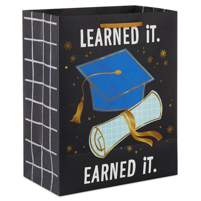 Medium black graduation gift bag with "Learned It. Earned It." and blue mortarboard and diploma, Hallmark, gold foil accents, 9.6 inch size
