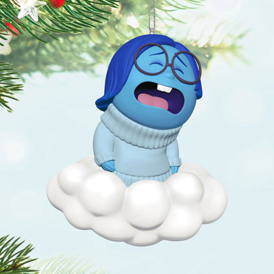 Hallmark Keepsake Inside Out 10th Anniversary Sadness ornament with Sadness sitting on a white cloud, Disney/Pixar Christmas decoration.