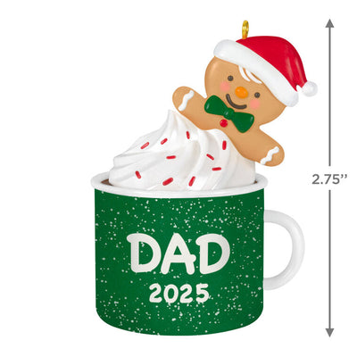 2025 Christmas ornament of gingerbread dad cookie in green mug with whipped cream, festive holiday design

