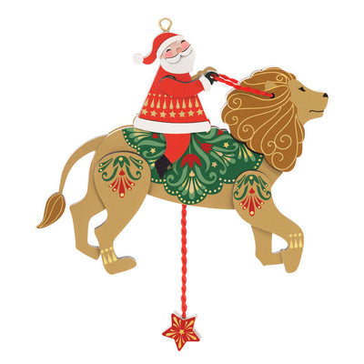 Wooden pull-string ornament of Santa riding a lion with moving reins and legs, inspired by jumping jack toys