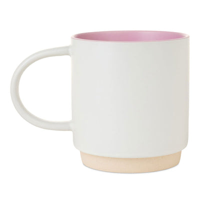 White ceramic mug with “Mom Sweet Mom” in colorful cross-stitch-style lettering and floral accents, oversized handle.