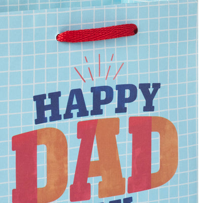 Light blue small gift bag with white grid pattern and bold 'Happy Dad Day' lettering, ideal for Father’s Day gifts.
