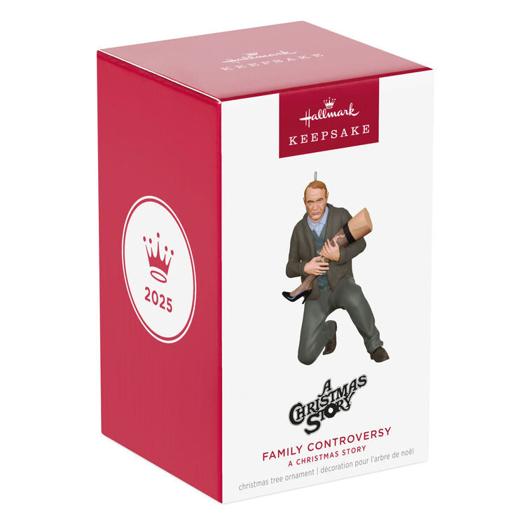Hallmark Keepsake ornament of Old Man Parker kneeling and cradling broken leg lamp, A Christmas Story movie scene