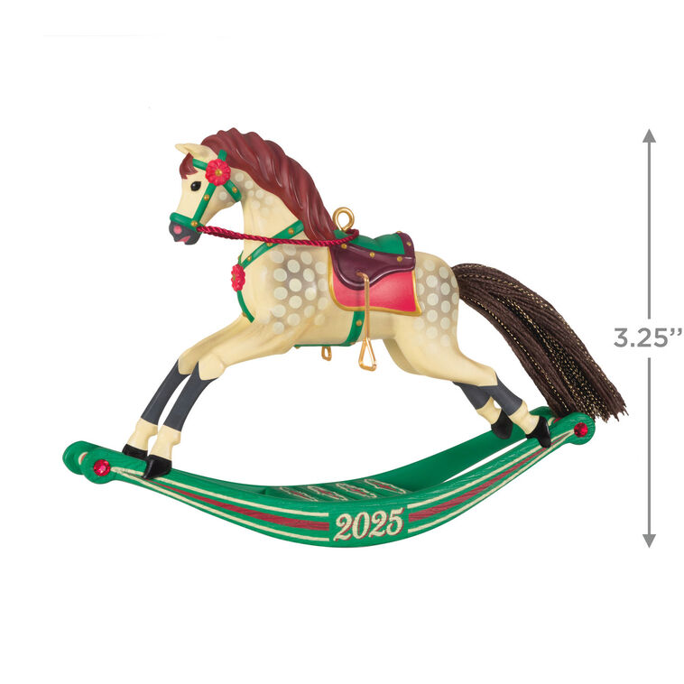 Hallmark Keepsake Rocking Horse Memories 2025 ornament—cream horse, brown mane and tail, red saddle, green sled base, red flower accents, year dated
