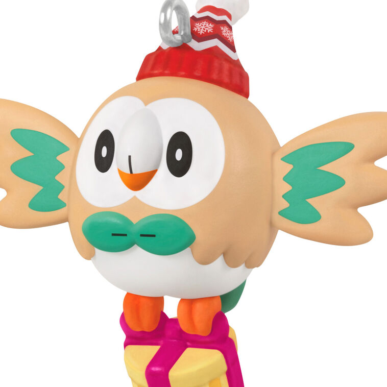 Mini Rowlet ornament, beige owl with green bow tie, red winter hat, and yellow gift box, Hallmark Keepsake Pokémon Christmas collectible

