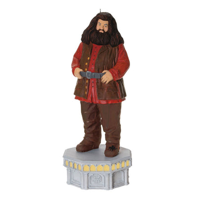 Hallmark Keepsake ornament of Hagrid from Harry Potter, standing on stone base with red coat, light and sound Chamber of Secrets Collection
