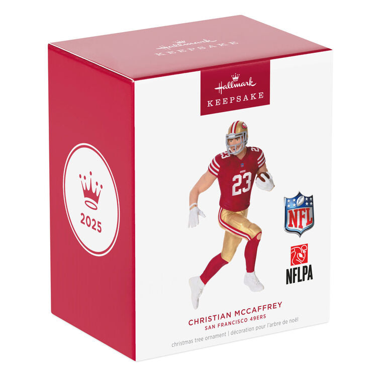 Christian McCaffrey ornament in 49ers red and gold uniform, number 23, action pose with football, Hallmark NFL Christmas collectible