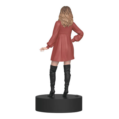 Alexis Rose ornament from Schitt's Creek in pink baby-doll dress with black boots, sound button on base.