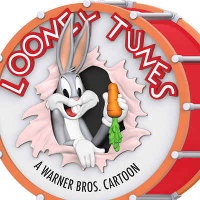 Bugs Bunny Looney Tunes ornament bursting through red drum with carrot in hand, 85th anniversary design