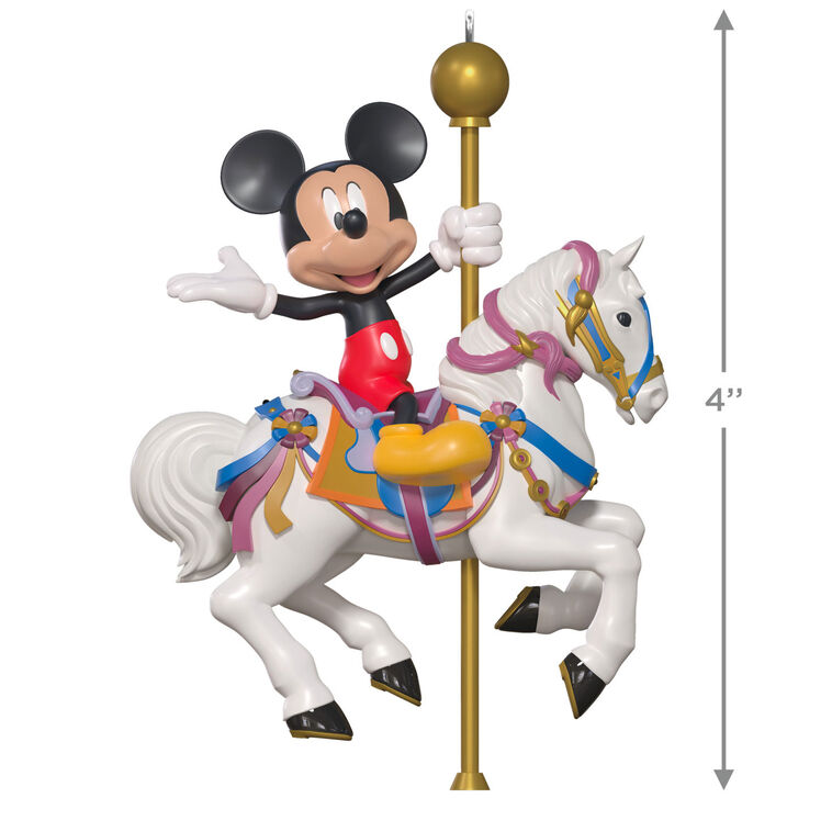 Hallmark Keepsake Disneyland King Arthur Carrousel ornament featuring Mickey Mouse riding a white carousel horse with gold pole, colorful saddle.