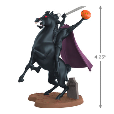 Headless Horseman Halloween ornament from Disney's Sleepy Hollow, riding black horse with sword and jack-o'-lantern