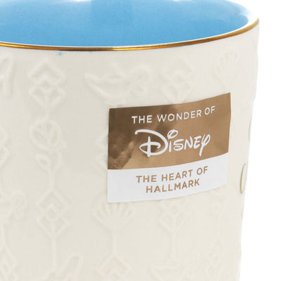White ceramic Disney Princess mug with gold foil accents, embossed movie icons, and “Dreams can come true” message, 13 oz.