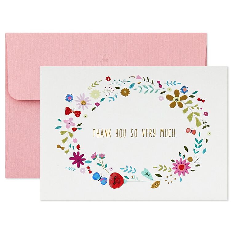Assorted whimsical note cards with gold foil accents in multiple designs, includes envelopes and reusable caddy.