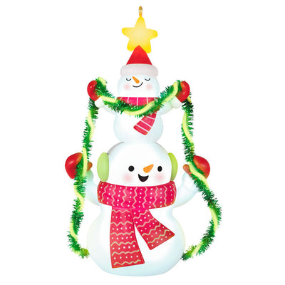 Stacked snowmen Christmas ornament wrapped in green tinsel garland with glowing star, battery operated light-up decor

