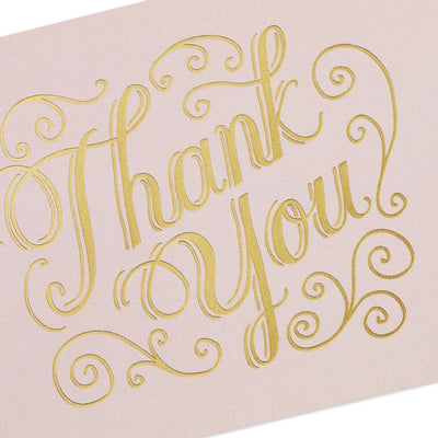 Assorted whimsical note cards with gold foil accents in multiple designs, includes envelopes and reusable caddy.