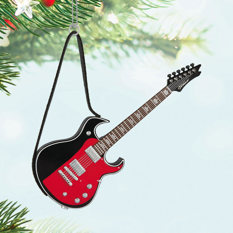 Red and black electric guitar Christmas ornament that plays “Street Fighting Man” by The Rolling Stones, battery operated


