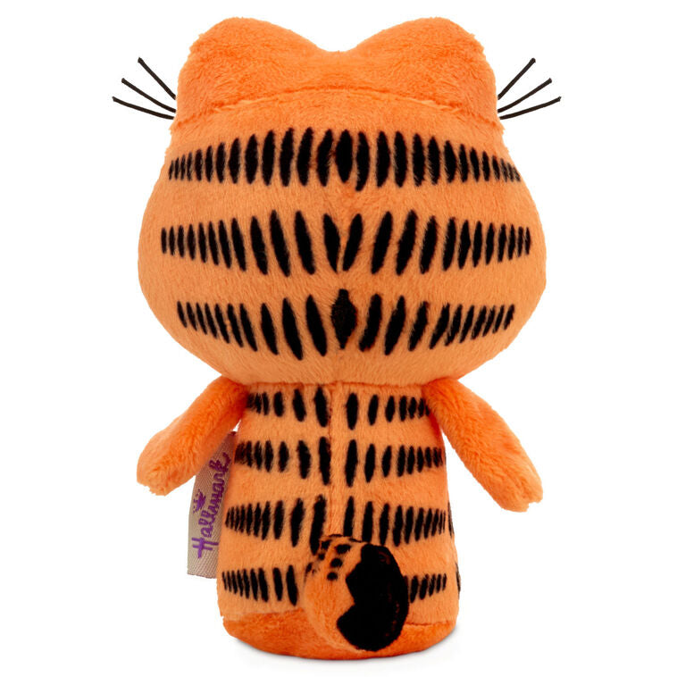 Garfield plush with orange fur, signature lazy expression, and love of lasagna.

