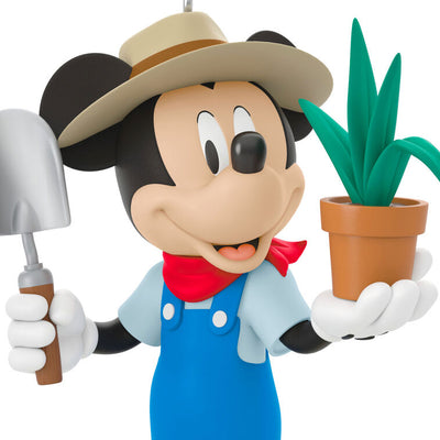 Hallmark Keepsake ornament of Mickey Mouse in overalls and sun hat, holding a potted plant and garden trowel, Disney All About Mickey series