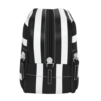 Late Bloomer 3-Zip toiletry bag with three compartments for organizing toiletries, makeup, or school supplies; stands upright.