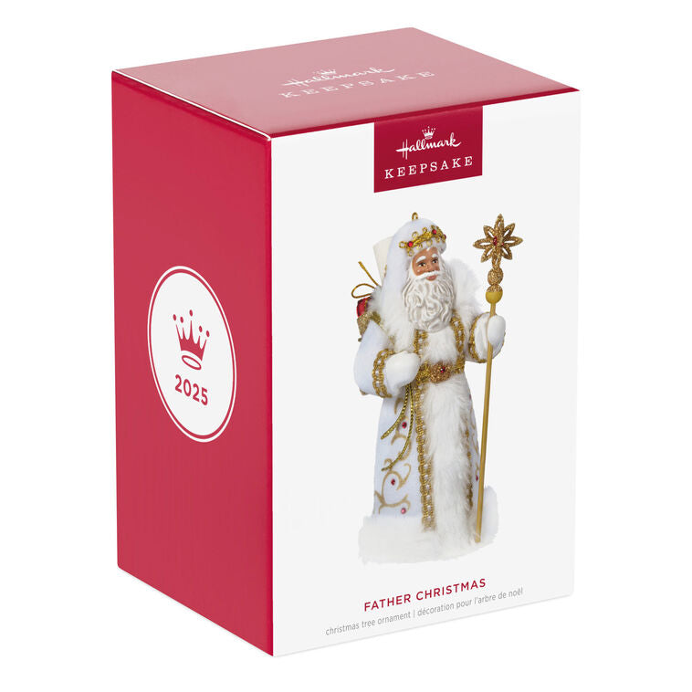 Black Father Christmas ornament in white coat with gold staff, faux-fur trim, and red gem accents.

