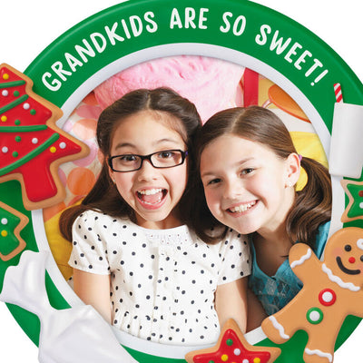 Photo frame ornament with cookies, milk, and frosting bag, celebrating grandkids with festive Christmas design

