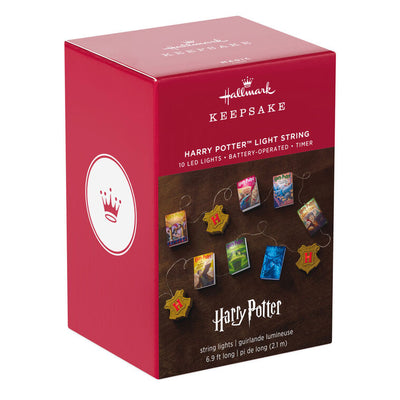 7-foot Harry Potter string lights with sculpted books and Hogwarts crests, white LED glow and clear wire.

