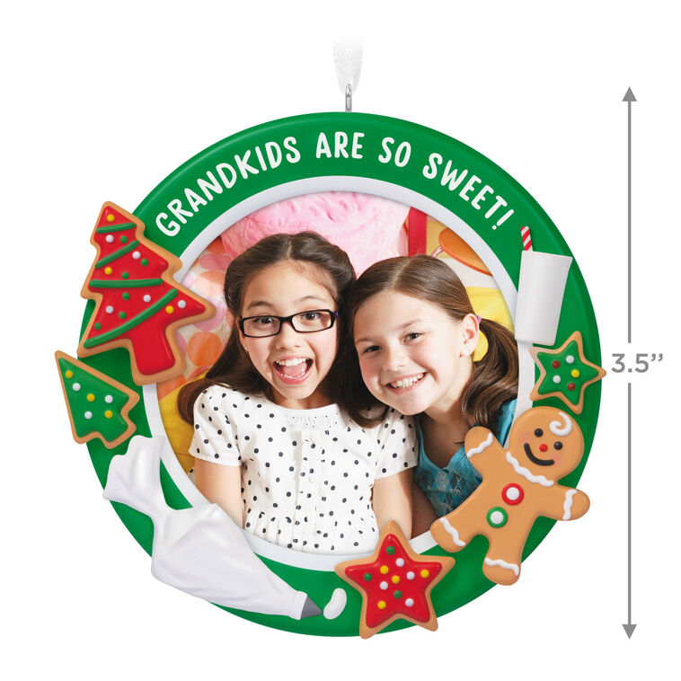 Photo frame ornament with cookies, milk, and frosting bag, celebrating grandkids with festive Christmas design

