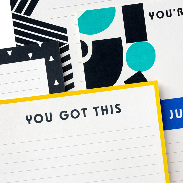 Hallmark flat note cards boxed set featuring bold geometric designs with modern shapes, stripes, and motivational text, pack of 20 cards and envelopes.
