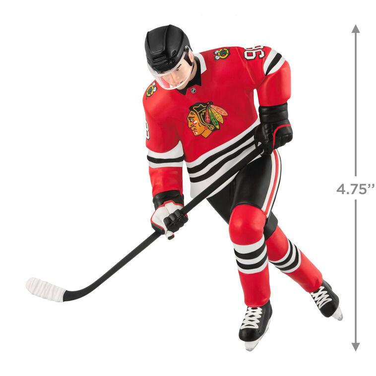 Connor Bedard ornament in Chicago Blackhawks jersey, number 98, action hockey pose, Hallmark NHL Christmas collectible for hockey fans
