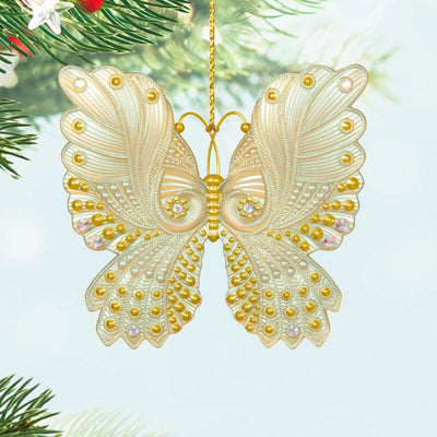 Brilliant Butterflies Christmas tree ornament with gold and pearlescent design, gem accents, and iridescent scalloped wings
