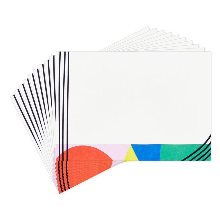 Flat note cards with colorful geometric border design and black parallel lines on white cardstock, wrapped in kraft band.
