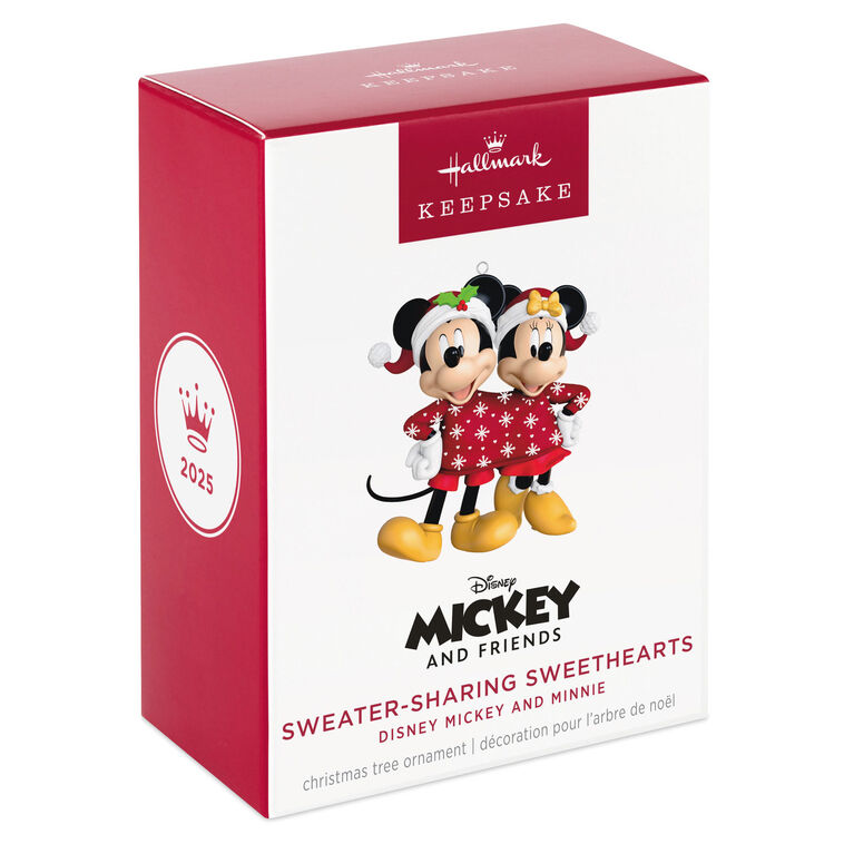 Mickey and Minnie wearing Santa hats and sharing a red Christmas sweater with snowflakes and hearts, Disney ornament.

