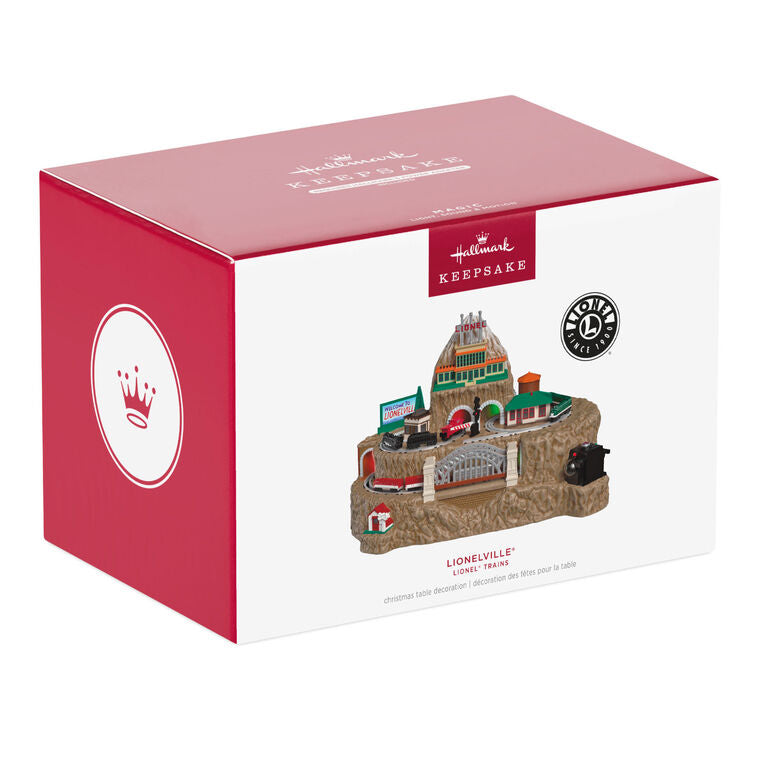  Hallmark Lionelville tabletop Christmas train decoration with moving train cars, conductor audio, and synchronized lights