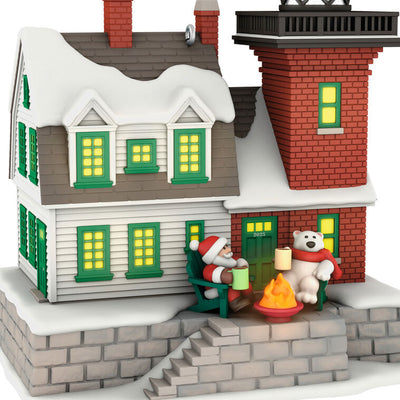 Hallmark Keepsake ornament of a brick lighthouse and home with Santa and polar bear, glowing windows and beacon, Holiday Lighthouse 2025
