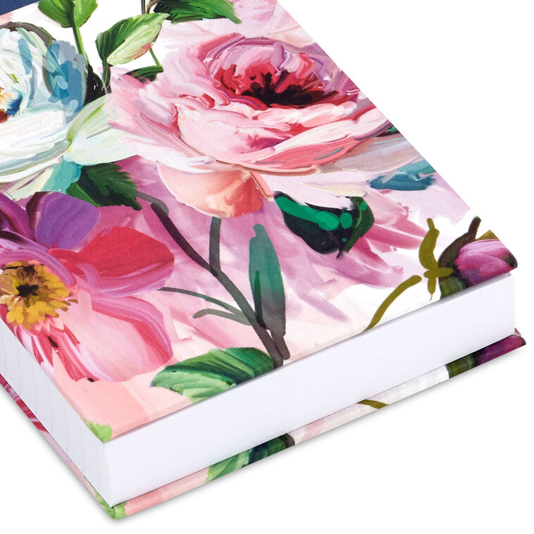 Small list pad with slate blue header and floral fabric cover featuring pink and white blossoms.
