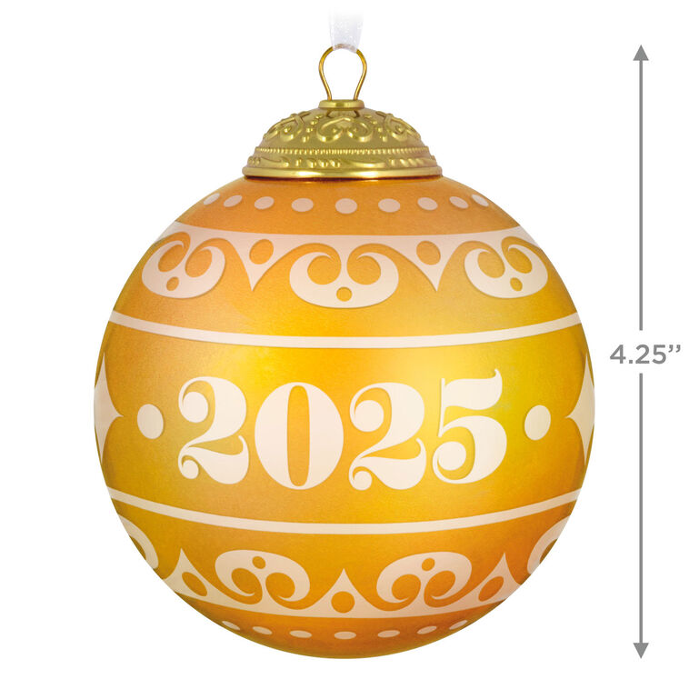Hallmark Keepsake Christmas Commemorative 2025 ornament—yellow frosted glass ball with elegant gold scroll design, embossed metal cap, and “2025