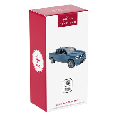 Blue Hallmark Keepsake metal ornament of 2026 Ram 1500 REV truck with detailed design, perfect for Christmas tree decorating.