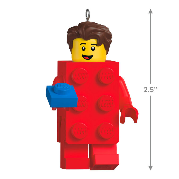 LEGO minifigure ornament with red brick body and blue hand-held piece, smiling boy with brown hair.