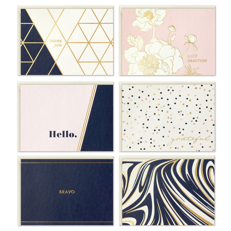 Assorted note card box with blush, navy, and gold foil floral, geometric, and marble designs; includes 24 cards and envelopes