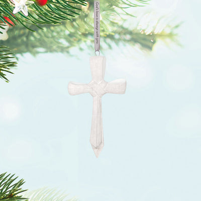 Porcelain cross ornament with palm leaf texture and ribbon inscribed with faith message, for Christmas or spiritual gift.