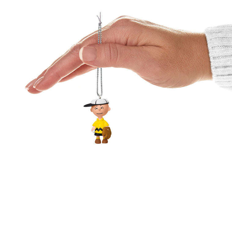 Set of two mini ornaments: Charlie Brown in baseball hat and glove, Schroeder in catcher’s gear, Hallmark Peanuts Christmas collectibles
