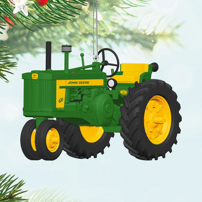 Hallmark Keepsake John Deere 620 Tractor ornament, die-cast metal in green and yellow, wheels turn, classic farm tractor design.