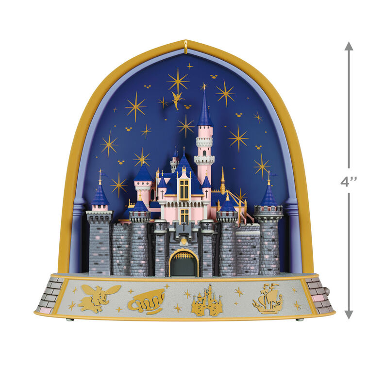 Disneyland 70th Anniversary ornament featuring Sleeping Beauty Castle, fireworks display, and shimmering lights in gold frame arch